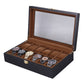 Black wooden watch storage box with brown interior and cushioned multi-slot tray