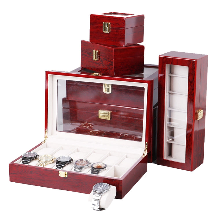 Red wooden watch storage box set with clear lid, padded slots, and side display