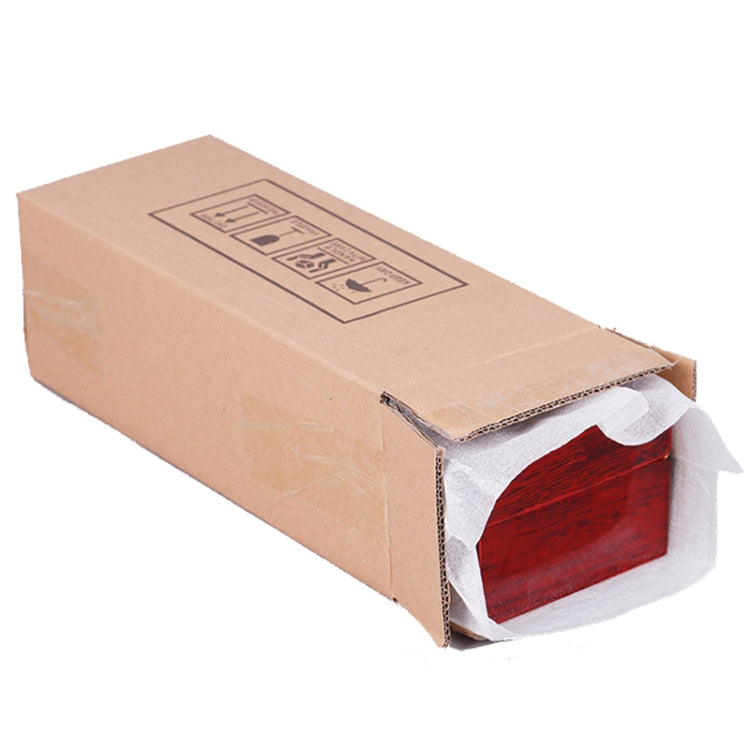 Red wooden watch storage box wrapped in kraft paper shipping carton, open side visible