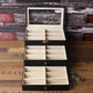 Black multi-tier glasses case with open lid and 3 rows of divided slots