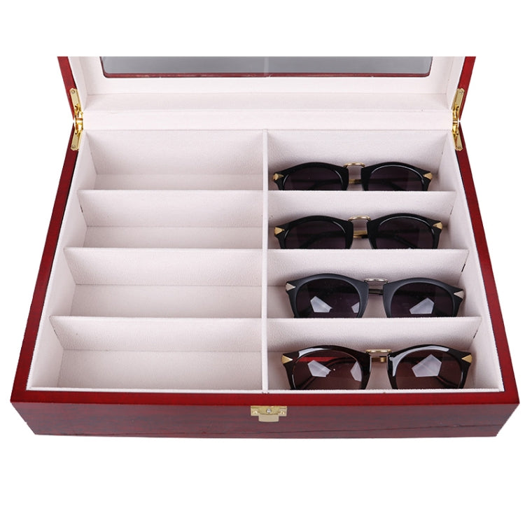 Red wooden glasses storage case with clear lid, holding four pairs of sunglasses