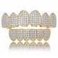 Zircon hip-hop grill braces close-up with gold edges and silver studded teeth rows