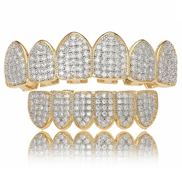 Zircon hip-hop grill braces close-up with gold edges and silver studded teeth rows