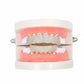 Zircon hip-hop grill braces with gold upper row and white lower row, on pink mold