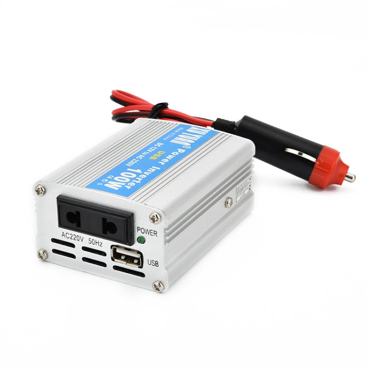 Car inverter with AC outlet and USB port, silver body with red/black leads