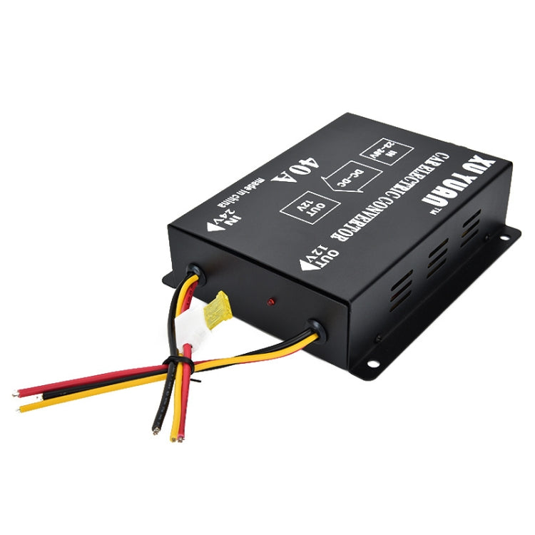 XUYUAN 24V to 12V converter underside view, black unit with screw terminals and wires