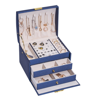 Navy blue three-layer jewelry storage box with open compartments for earrings and rings