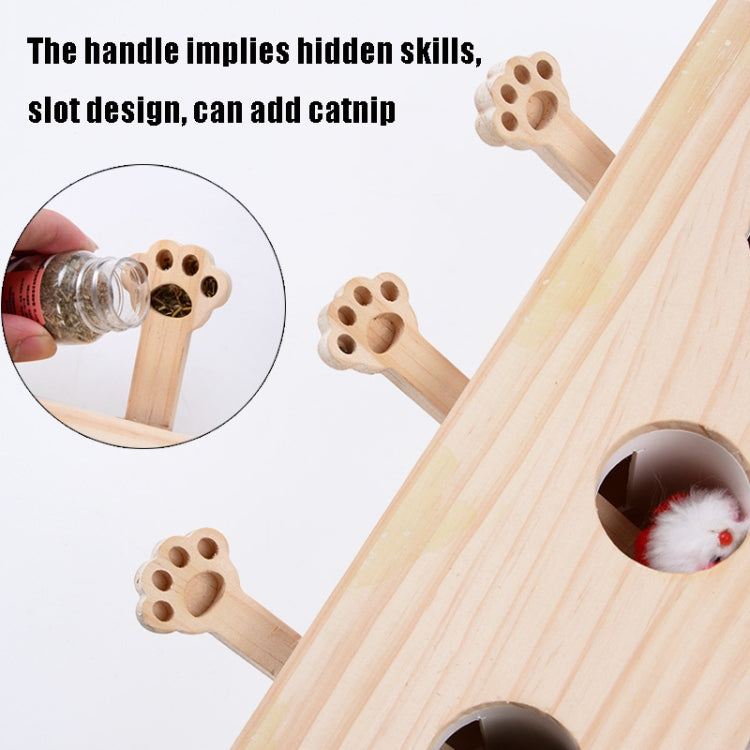 Wooden cloud cat puzzle toy with paw-shaped holes and a hidden fuzzy mouse ball.