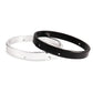 Silver and black motorcycle headlight mounting rings together
