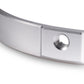 Silver headlight mounting ring bracket close-up of fastener opening