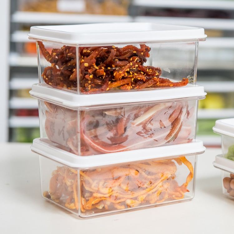 Three stacked clear refrigerator food containers with white snap lids
