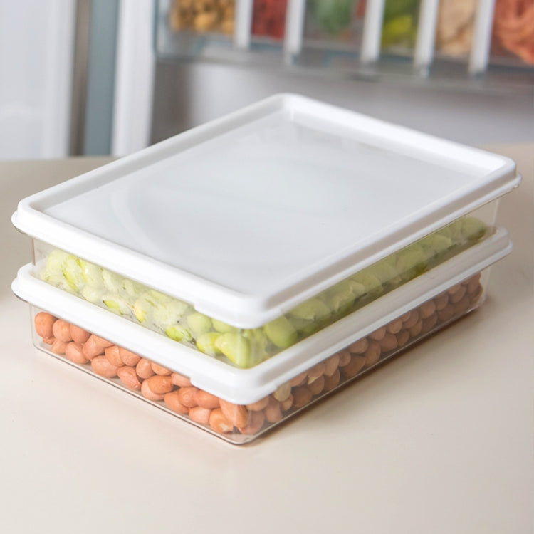 Stacked refrigerator storage boxes with lid, filled with vegetables and beans