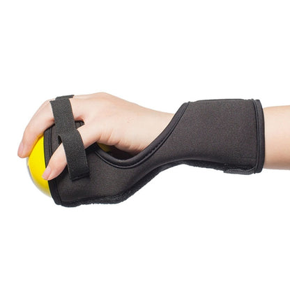 Black wrist strap hand grip device with yellow ball for strengthening exercise