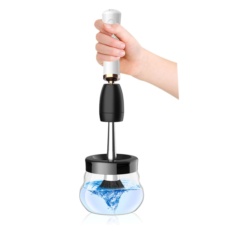 Electric makeup brush cleaner with splash-cleaning cup while brush is in use