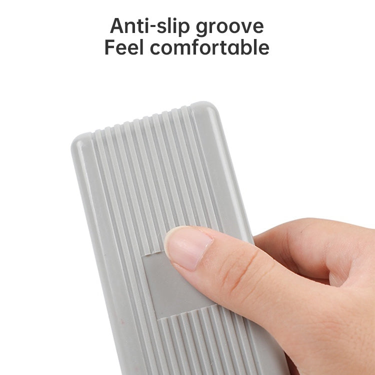 Whiteboard eraser with anti-slip grooves, comfort grip shown by hand