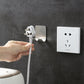 Hand placing a razor into a stainless steel wall hook