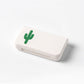 White portable medicine box with 3 compartments and green cactus graphic on lid