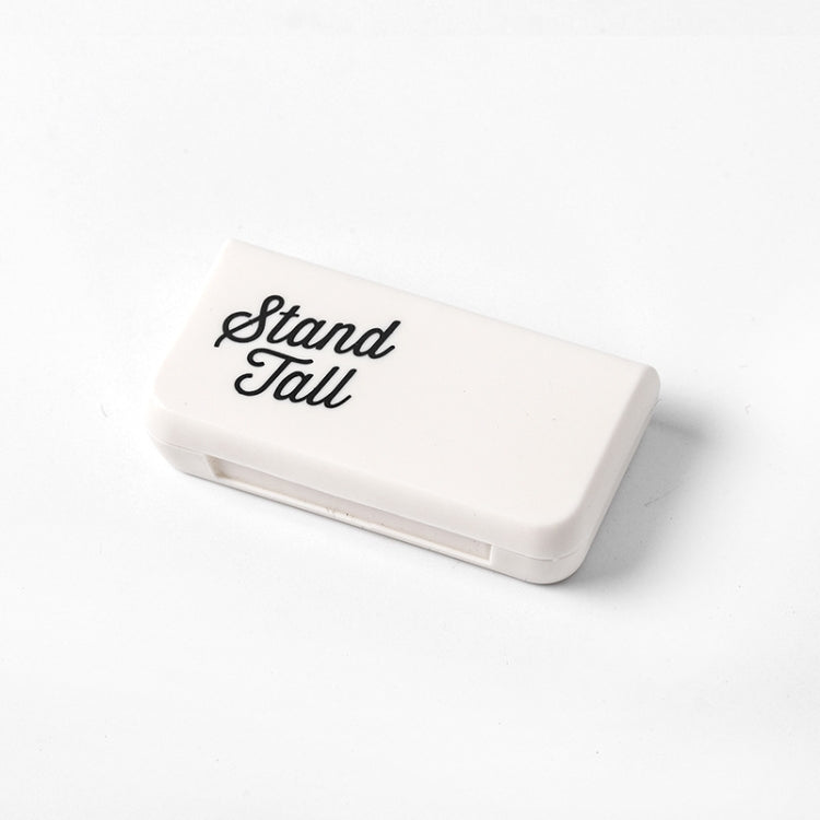 White portable medicine box with 3 compartments and “Stand Tall” text on lid