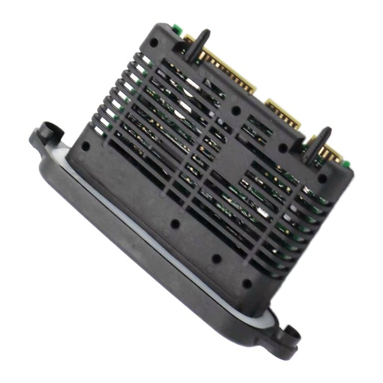 LED driver module underside with black vented cover and gold pin contacts