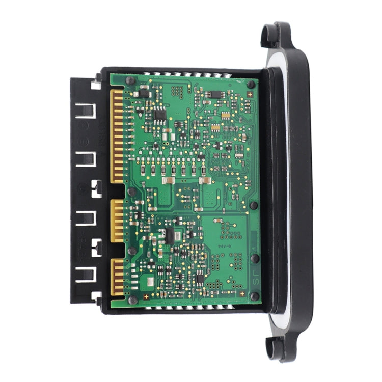 LED headlight control module with green PCB and gold edge connector, side view