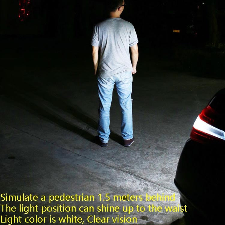 Bright LED reversing auxiliary light glowing near the vehicle