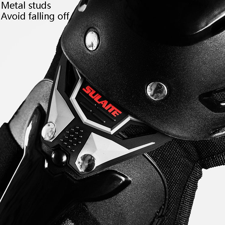 Motorcycle knee pad plate close-up with metal studs and black protective shell