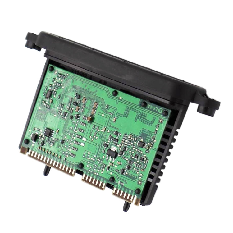 LED headlight driver module showing green electronics and pin connectors, black casing
