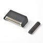 Black foil cutter head with attached spring blade and spare replacement blade