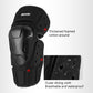 Elbow protective pad close-up, black carbon-fiber style shell with cushioned edges
