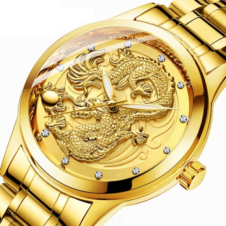 Gold-tone watch close-up with engraved dragon design, crystal dots on the dial, metal case.