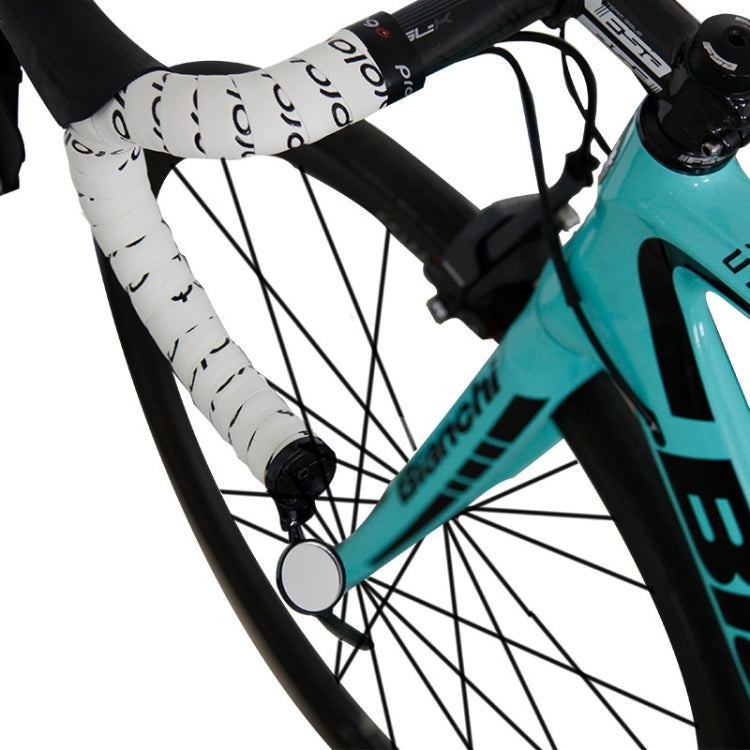 Close-up of black bicycle handlebar plug reflector mirror on road bike