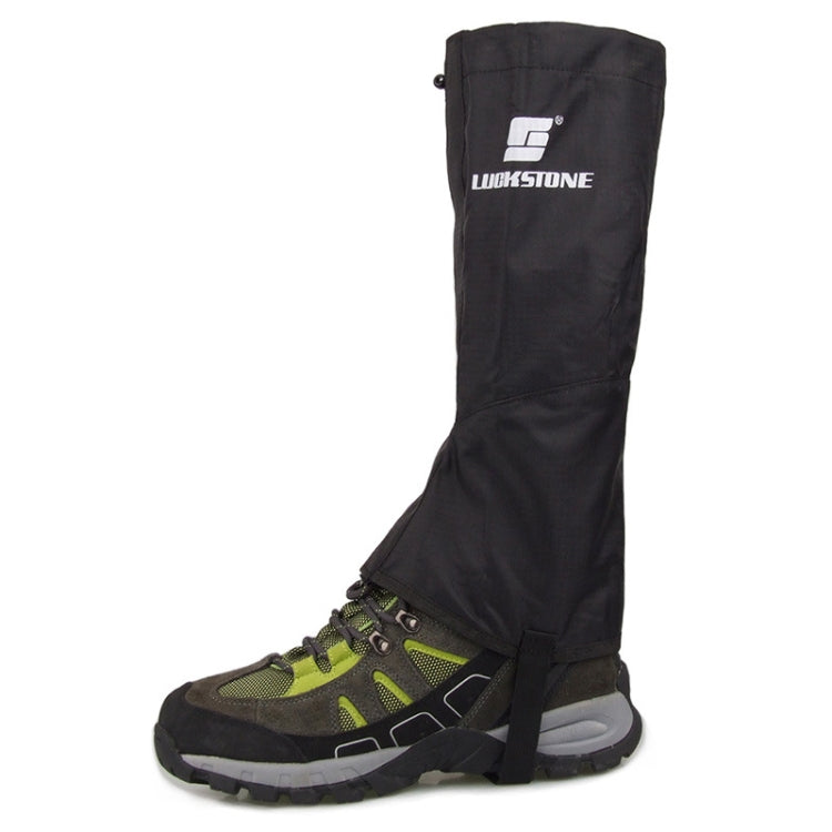 Black waterproof boot covers with ankle strap and logo patch, over trail shoe