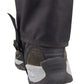 Black foot cover with elastic cuff over shoe toe and treaded sole