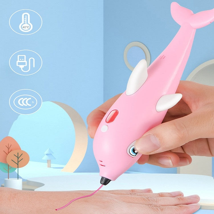 Pink dolphin-shaped 3D printing pen held in hand, dispensing glowing filament