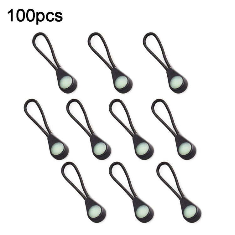 Set of luminous backpack zipper pulls, black cords with light green oval heads