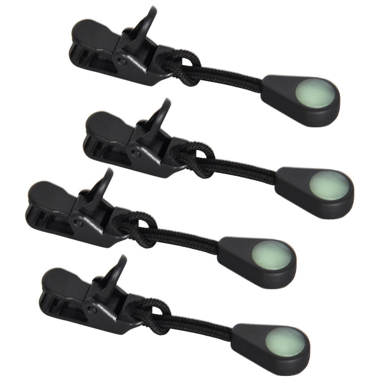 Four luminous zipper pull tabs with black clips and light green oval glow centers
