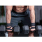 Black half-finger gloves worn while holding dumbbells for workouts