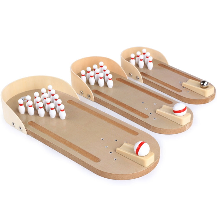 Two desktop wooden bowling puzzle toys with pin sets and ball launchers