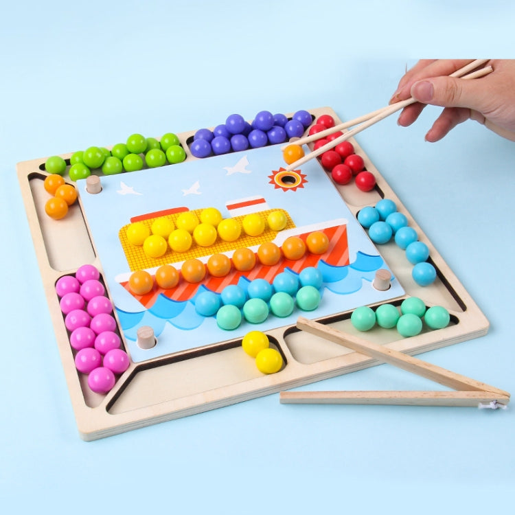 Colorful bead-matching board with beads and chopsticks held by a hand