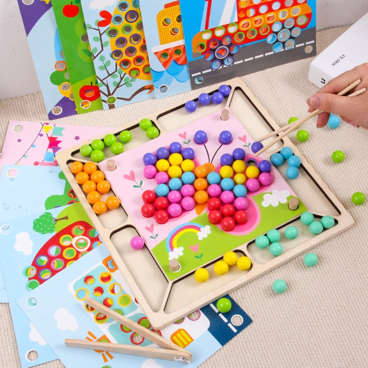 Wooden bead board kit with rainbow clip beads and chopsticks laid out for play