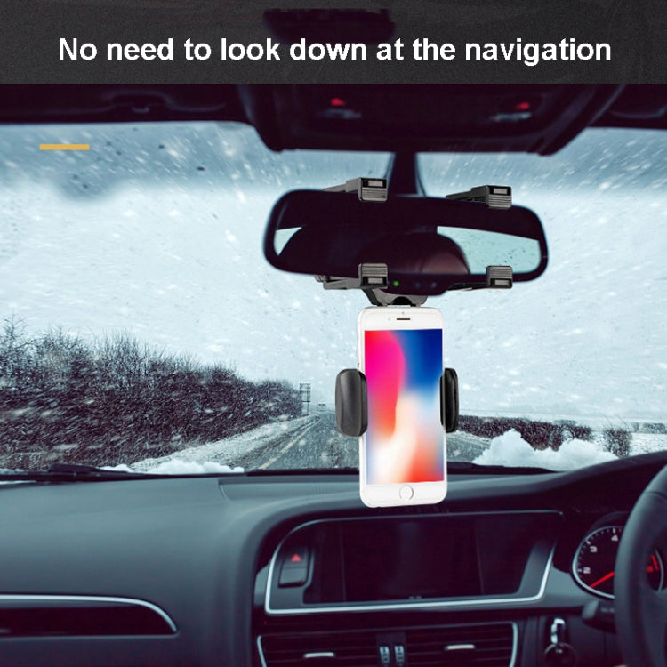 Black rearview mirror phone bracket holding a smartphone inside the car