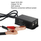 Black 4-USB phone charger with label side and battery alligator clips