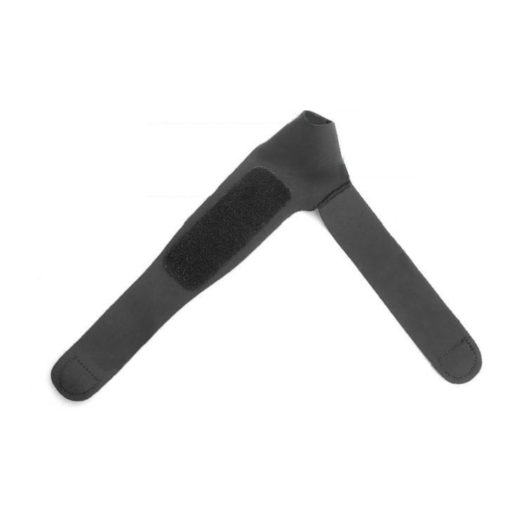 Black elastic wrist brace with thumb cover and soft felt pad insert.
