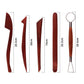 Assorted pottery clay carving tools with dark red wooden handles and a wire loop tool