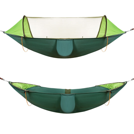 Green double camping hammock with mosquito netting and open ends