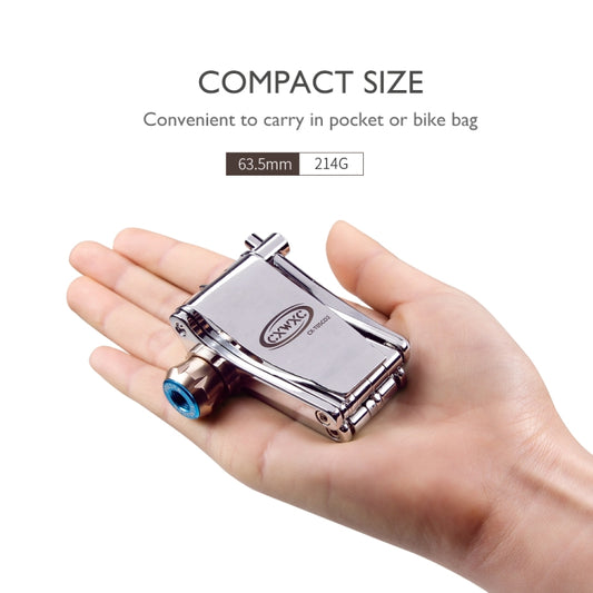 Bicycle CO2 inflator multitool in hand, compact pocket size