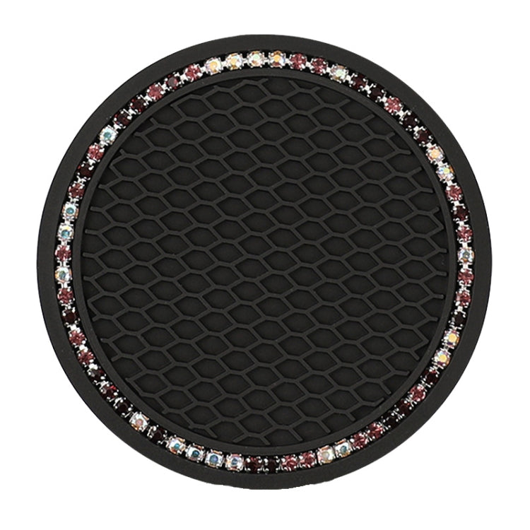 Black circular car cup coaster mat with honeycomb texture and rhinestone-trim border.