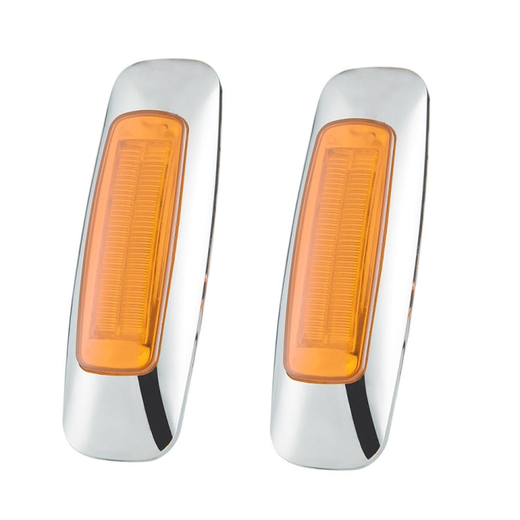 Amber/yellow rectangular side marker light with chrome bezel and clear LED lens