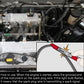 Ignition spark test pen held near engine bay to check spark plug wire