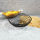 Wrought iron oval wire snack basket with spiral base